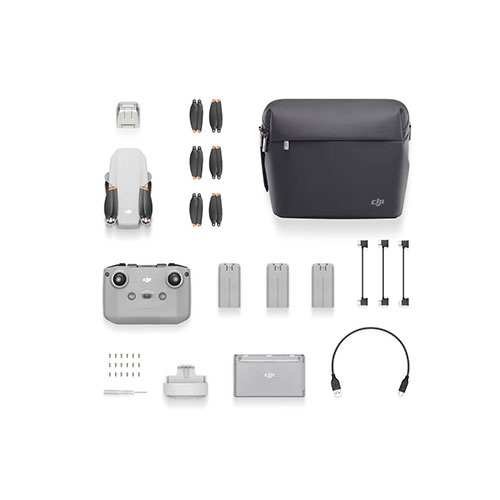 Collection of DJI drone accessories including remote control, battery, and carrying case on a white background