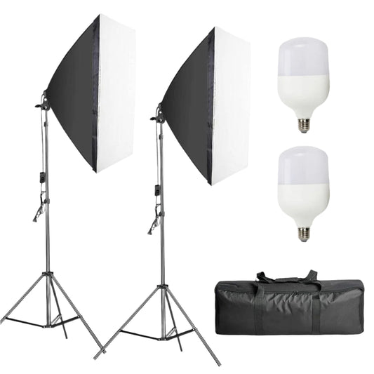 Photography studio light kit with softboxes, lights, and carrying case on a white background